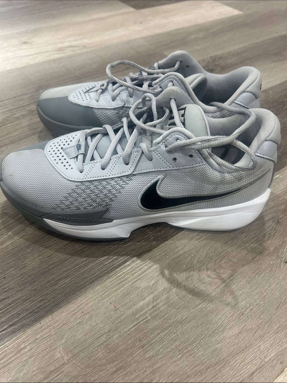 Nike Light Gray and White Tennis Shoes with Black Swoosh